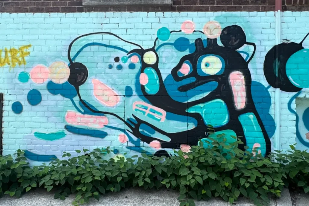 Blue native inspired mural with figure